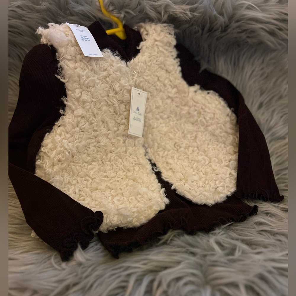 Baby Gap  Faux Fuzzy Vest 49.00 and a Brown Turtle neck top 12.95, size 2 years